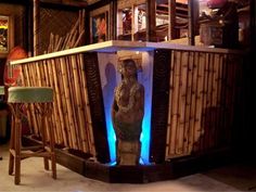 a display case in the shape of a man's head and torso is shown