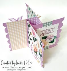 an open card with flowers on it and some words written in the inside of it