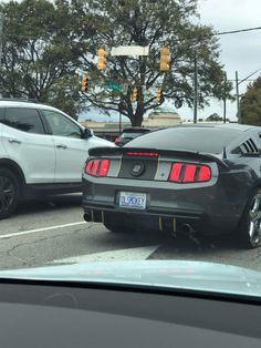 the rear end of a car that is stopped at an intersection