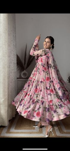 PRODUCT DESCRIPTION :-Presenting Dusty floral Printed chiffon tiered pattern Anarkali with matching Chiffon dupatta and cotton Pants . The Soft shade and Rose flower print is such a breathtaking combination . Anarkali :- Chiffon Pant :- CottonDupatta :- ChiffonClosure Used:- Side zipColor:- BeigeCare Instructions :- Dry clean onlyModel Size :- Model is wearing XS sizeModel Height :- 5.6''DISCLAIMER :- Slight color variations may occur due to different screen resolution. Floral Print Georgette Sharara For Eid, Floral Print Semi-stitched Floor-length Sharara, Semi-stitched Floral Print Floor-length Sharara, Eid Floral Print Georgette Sharara, Multicolor Floral Print Georgette Sharara, Eid Georgette Sharara With Floral Print, Floral Print Georgette Maxi Lehenga, Floral Print Georgette Lehenga Maxi Length, Floral Print Floor-length Anarkali Set For Navratri