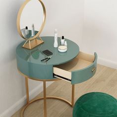 a table with a mirror and other items on it