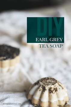 two tea soaps sitting on top of a white towel with the words diy