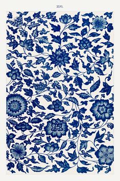 a blue and white wallpaper with flowers on it