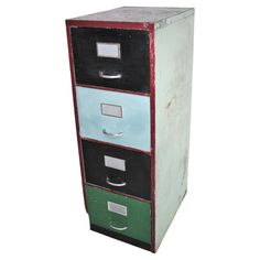 a multicolored file cabinet with four drawers