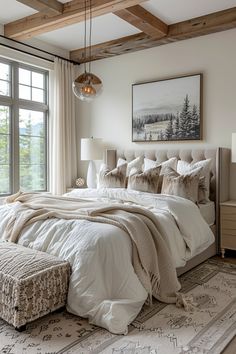 Cozy bedroom with a large bed, neutral bedding, and rustic wooden ceiling beams. Easy Bedroom Ideas, Neutral Bedroom Paint Colors, Design Bedroom Aesthetic, Neutral Bedroom Decor Ideas, Neutral Bedroom Paint, Inviting Aesthetic, Bedroom Decoration Ideas, Chic Bedrooms, Earthy Neutrals