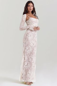 There's a sense of romance about our 'Artemis' dress. Beautifully made from exquisite, delicate lace and underpinned with our figure cinching cafe au lait power mesh, it features a corseted bodice that's gorgeously gathered with lace up detailing ... White Lace Dress Maxi, Lace Ivory Dress, Mesh White Dress, Long Lace White Dress, Full Sleeve Prom Dress, Artemis Dress, White Lace Outfit, Silk And Lace Dress, White Lace Dresses