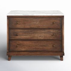 a wooden dresser with marble top and drawers on it's sides, against a white background