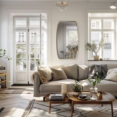 a living room filled with furniture and lots of window sill space in front of it