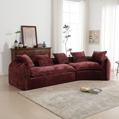 a living room filled with furniture and a rug