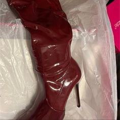 Lekisha Stiletto Boot Size 9 A High Stiletto Boot With A Pointed Toe And Zip Closure. Material: Faux-Leather Features: Sd Dream Sole - Double The Padding For Comfort, Support, And Ease Of Movement Platform Height: 0.2" Outside Heel Height: 4.5" Closure: Functional Inside Zipper Shaft Height: 22.5" Elegant Burgundy Party Boots, Chic Synthetic Knee-high Boots For Party, Burgundy Heels For Party, Fitted Burgundy Heels For Party, Red Heeled Boots For Party, Burgundy Leather Heeled Boots For Party, Burgundy Fitted Heeled Boots For Party, Chic Synthetic Knee-high Party Boots, Chic Burgundy Heeled Boots For Parties