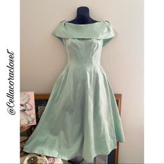 Beautiful Vintage Rare Lorrie Deb Dress Authentic From The 50s, No Damage And In Great Condition!. The Dress Is A Beautiful Seafoam Green Satin With Tulle Lining. Zipper Is Under The Bow In The Back And Works Perfectly. So Pin-Up! Would Best Fit A Size S. Measurements. Armpit To Armpit 16in Flat Bust 18in Flat Waist 25in Around Length 42in Comment If You Have Any Questions! Vintage Fitted A-line Tea Length Dress, Vintage A-line Tea Length Dress, 1950s Style A-line Vintage Dress For Events, Fitted A-line Tea Length Vintage Dress, 1950s Style A-line Vintage Dress For Vintage Events, 1950s A-line Vintage Evening Dress, 1950s Style A-line Vintage Evening Dress, Vintage Midi Dress For Wedding, Vintage Knee-length Cocktail Dress