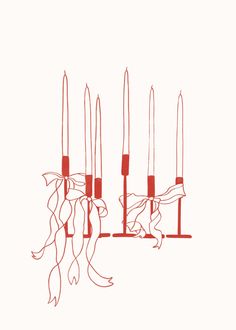 four red candles with long sticks sticking out of them, in the middle of a white background