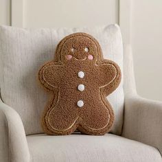 a ginger pillow sitting on top of a chair