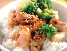 a white bowl filled with rice and broccoli