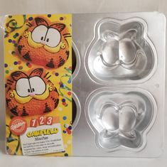 two cake pans in the shape of animals