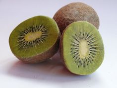 the kiwi is cut in half and ready to eat