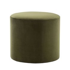 a large round ottoman in green velvet