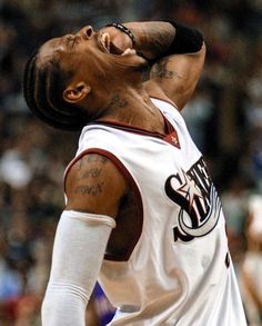 a basketball player with his head in the air