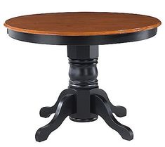 a round wooden table with black legs and an oak top, on a white background