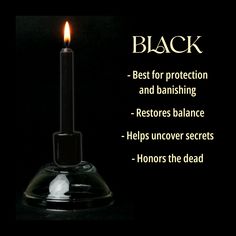 a candle with the words black on it