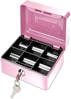 an open pink box with keys in it