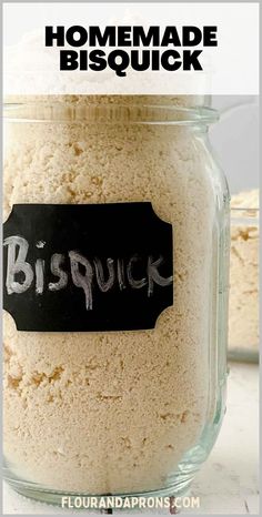 a close up of a jar of food with the words biscuit written on it