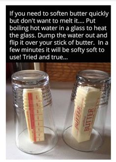 two jars with fake toothbrushes in them sitting on a counter next to each other