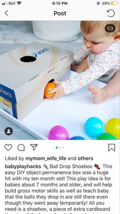 the baby is playing with an orange ball in front of a box that says, i love my mom wife and others