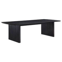 a black table sitting on top of a white wall