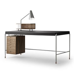 an office desk with two drawers and a lamp