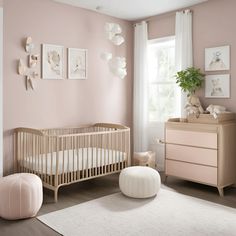 a baby's room with pink walls and furniture