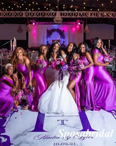 a group of women standing next to each other in front of a white and purple dance floor