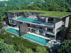 an artist's rendering of a modern house with a pool in the middle of it