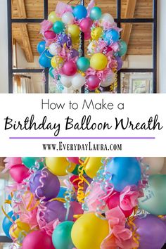 balloons and streamers hanging from the ceiling with text overlay that reads how to make a birthday balloon wreath