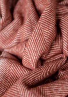 a close up view of a red and white striped fabric