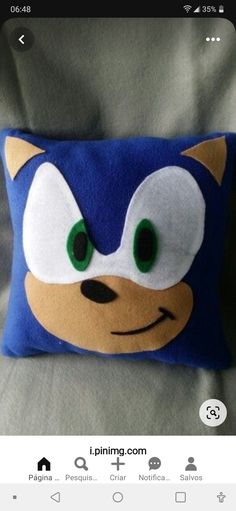 an image of a pillow that looks like sonic the hedgehog from mario kart