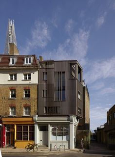 an old building with a clock tower on top