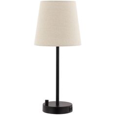 a lamp that is on top of a black stand with a white lampshade