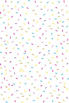 colorful sprinkles on a white background for wallpaper or wrapping paper design