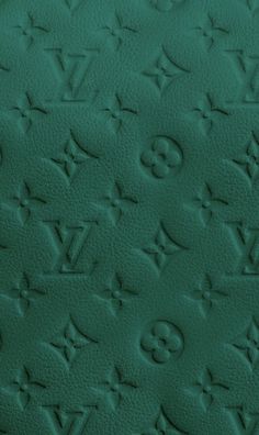 an image of a green leather background