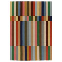 a multicolored rug with vertical stripes on the bottom, and an area rug in the middle