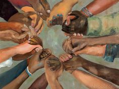 a group of people holding hands in the middle of a circle with their fingers together