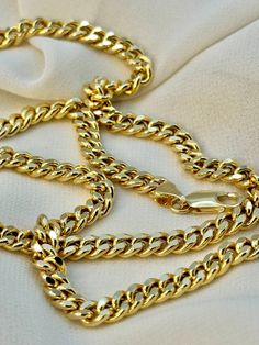 "14k Gold Curb necklace, 21.33 gr , 25.5\" inches,5 mm 14k Gold Curb necklace, 19.97 gr , 24\" inches  , 5 mm 14k Gold Curb necklace, 18.17 gr , 22\" inches  , 5 mm 14k Gold Curb necklace, 16.40 gr , 20\" inches  , 5 mm Priced to sell! Compare our prices to other similar sellers! Arrives in a GIFT BOX and includes FREE SHIPPING within the USA and Canada. International shipping is available at the most economical rates on ETSY. I HAVE BEEN IN THE JEWELRY BUSINESS ALL MY LIFE. I am a second -gener Men's Necklace Gold, Gold Necklace For Men, Real Gold Chains, Gold Curb Chain, Mens Cross Necklace, Gold Jewelry Gift, Best Gifts For Him, Real Gold Jewelry, Gold Chains For Men