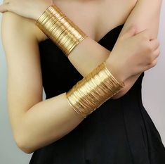 The Cuff It arm cuff is such a beautiful piece! Style it up with dressy looks or down to make your casual looks pop! Color: Gold, Silver Golden Arm Cuff, Gold Arm Bands, Silver Arm Cuff, Night Costume, Misty Night, Gold Arm Cuff, Gold Arm Band, Clothes Reference, Pop Color