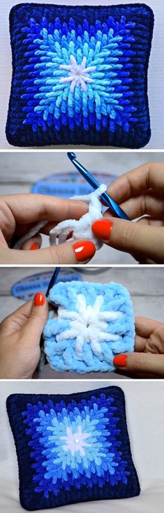 crocheted blue and white pillow being worked on by someone with orange nail polish