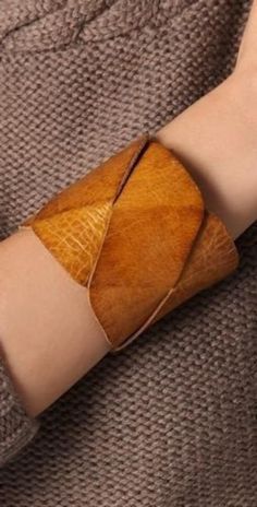 "Get a statement piece! A cuff that would stand out! combining a clean and a Boho look.  Rich leather, all natural dyes and process handmade by artisans in Morocco. Measures: Women's leather cuff, braided pattern 2.75\" wide ,8\"-8.5\" long when closed , two snaps adjustment" Art Du Cuir, Diy En Cuir, Wrap Armband, Handmade Leather Jewelry, Boho Cuff, Leather Jewellery, Handmade Leather Bracelets, Braided Leather Bracelet, Bracelet Boho