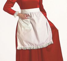 a woman in a red and white dress is standing with her hands on her hips