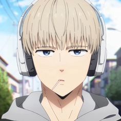 an anime character with headphones on his ears looking at the camera while he is listening to music