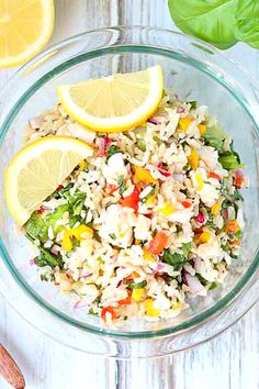 a bowl of lemon basil chicken salad with cold rice. Lunch Easy Ideas, Lemon Basil Chicken Salad, Cold Chicken Recipes, Chicken And Rice Salad, Basil Chicken Salad, Chicken Salad Chick Recipe, Cold Chicken Salads, Chicken Salad Bowls, Christmas Leftovers Recipes