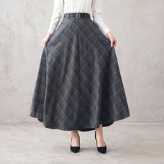 "This winter wool skirt is a classic piece of tailoring that will see you through rain or shine. It is cut with a flattering flared skirt to give you a wonderful shape. The winter skirt is perfect classic styling and ends at the ankle. This is a versatile skirt that you'll wear again and again. DETAILS: * More colors available https://etsy.me/2WgHgmy * 30% wool, 30% fiber, 40% polyester * fully satiny liner * Two side pockets * Right zip closure * with belt loops * back elastic band to provide s Classic High Waist Skirt For Fall, Classic High-waist Skirt For Fall, Winter High Waist Pleated Maxi Skirt, High Waist Pleated Maxi Skirt For Winter, Wool Maxi Skirt For Workwear In Winter, Fitted Wool Full Maxi Skirt, Wool Midi Pleated Skirt, Wool Pleated Long Skirt, Winter Wool Lined Maxi Skirt